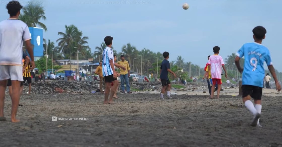 Children playing football on the beach at Nainamvalappu in Kozhikode. Photo: Manorama Online