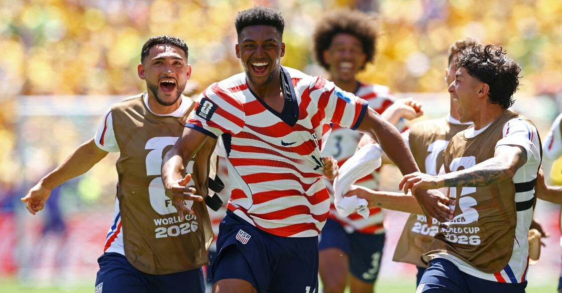 Alex Freeman of the US celebrates scoring their second goal with Cristian Roldan and Alex Zendejas. Photo: Reuters