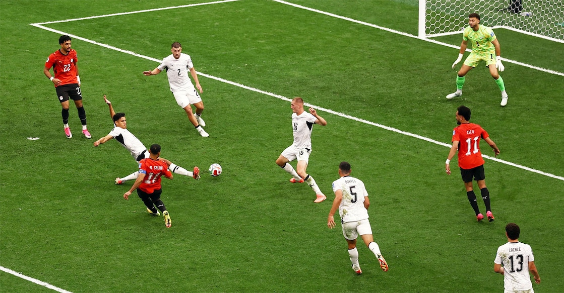 Egypt's Mohamed Salah scores their second goal past New Zealand's Max Crocombe. Photo: REUTERS/Lee Smith