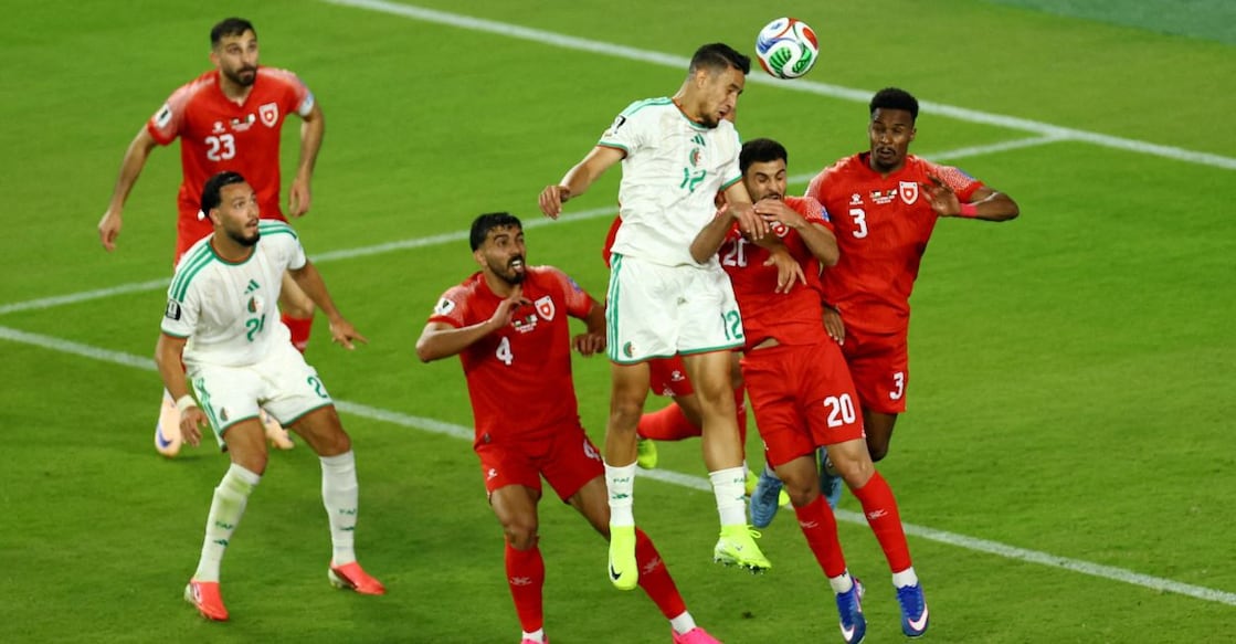 Algeria's Nadhir Benbouali scores their first goal. Photo: REUTERS/Luisa Gonzalez