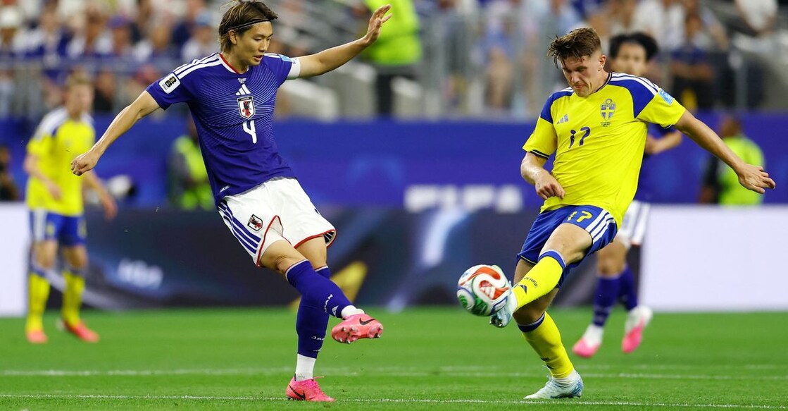 Japan's Kou Itakura in action with Sweden's Viktor Gyokeres. Photo: Reuters. 