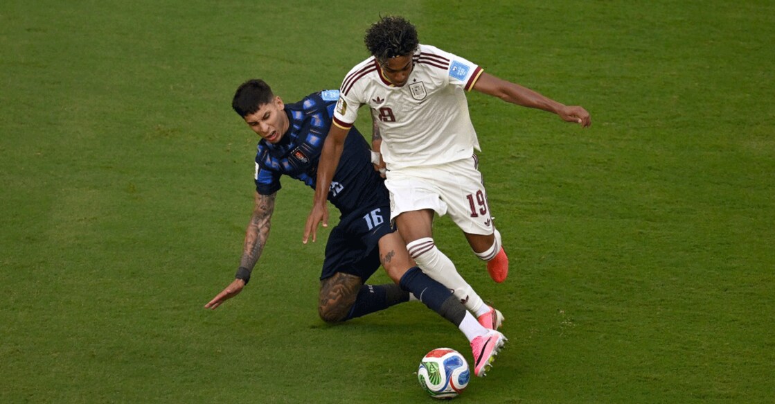 Uruguay's defender Mathias Olivera (left) and Spain's forward Lamine Yamal fight for the ball during the 2026 World Cup Group H football match at the Guadalajara Stadium in Zapopan on June 26, 2026. Photo: AFP/ Alfredo Estrella 