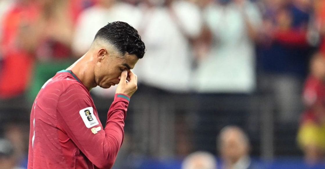 Cristiano Ronaldo looks dejected after the match against Spain. Photo: AFP