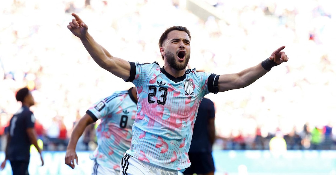 Belgium's Nicolas Raskin celebrates after Charles De Ketelaere scores their first goal. Photo: Reuters. 