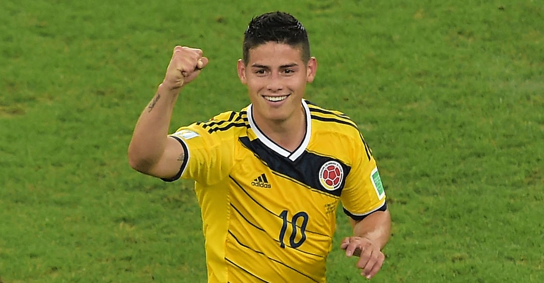 Colombia's midfielder James Rodriguez celebrates scoring the 2-0 goal during the Round of 16 football match between Colombia and Uruguay at the Maracana Stadium in Rio de Janeiro during the 2014 FIFA World Cup in Brazil on June 28, 2014.  AFP PHOTO / GABRIEL BOUYS (Photo by Gabriel BOUYS / AFP)