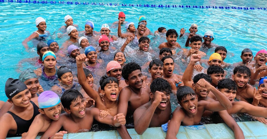 Swimmers from Thiruvananthapuram celebrate clinching the overall title in aquatics at the Kerala State School Games at Pirappancode on October 25, 2025. Photo: Special arrangement 