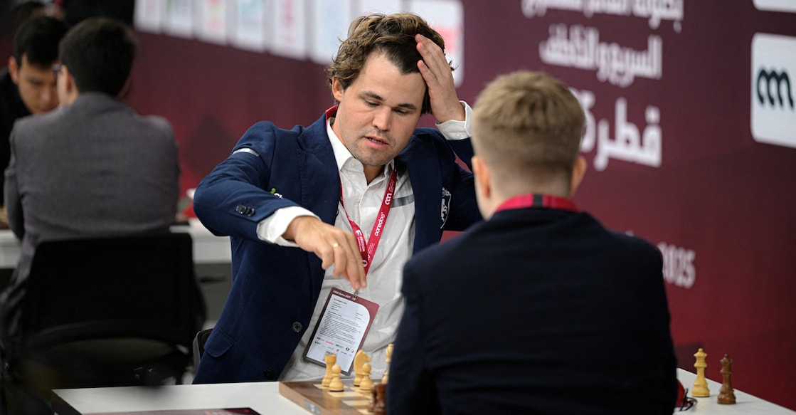 Magnus Carlsen plays against Sarana Alexey during the 10th round of the FIDE World Rapid Championship 2025 at the Sports and Events Complex at Qatar University in Doha on December 28, 2025. Photo: AFP/ Mahmud Hams