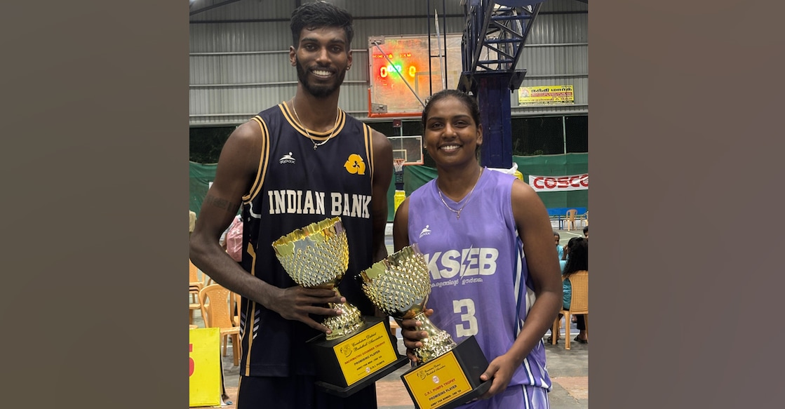 Pranav Prince and Sreekala R pose with their best player trophies. Photo: Special arrangement