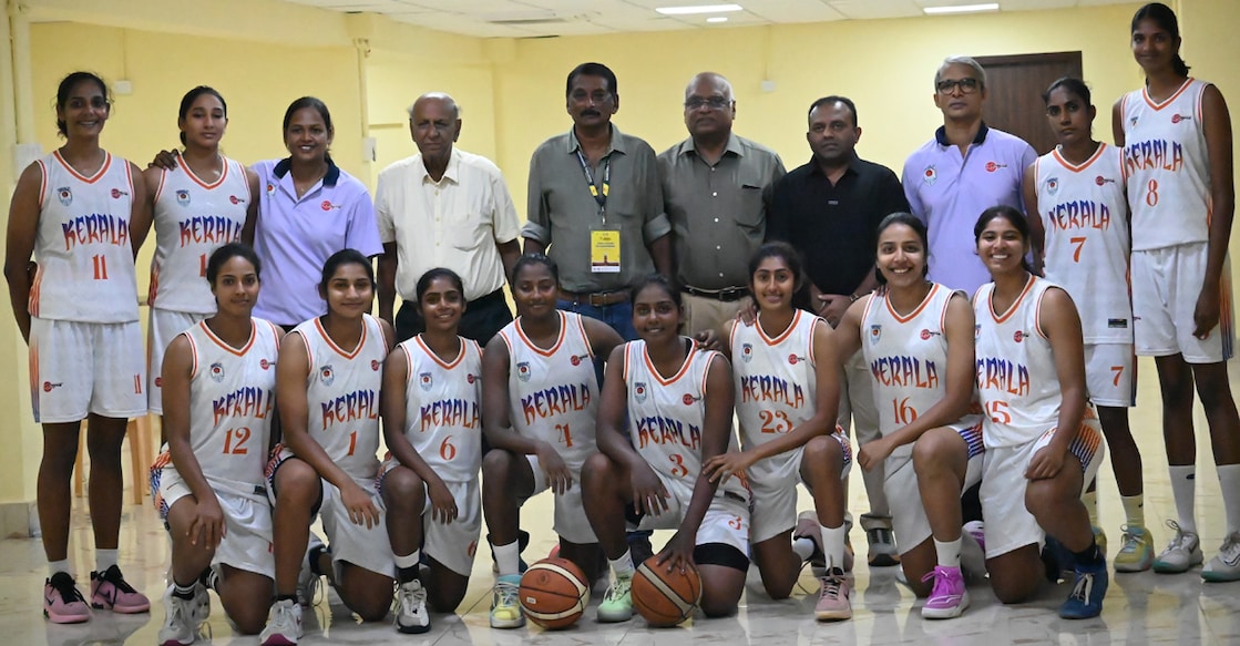 Kerala players posing with staff and officials. Photo: Special arrangement
