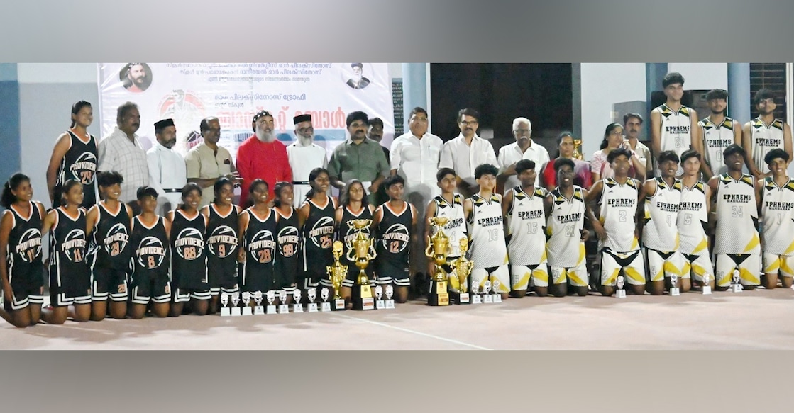 Providence HSS, Kozhikode (L) and St Ephrem's HSS, Mannanam, pose for a picture after winning the finals in the girls and boys categories, respectively, for the Mar Philexinos Trophy. Photo: Special arrangement