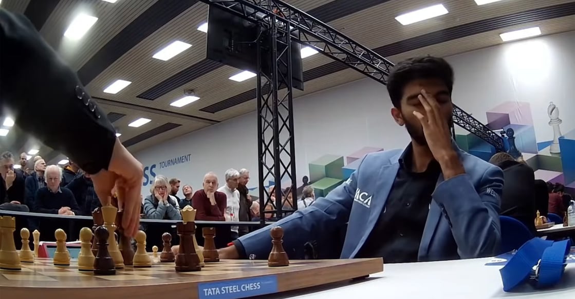 D Gukesh sits in disbelief after losing to Nodirbek Abdusattorov in round six of the Tata Steel Chess Masters 2026 at Wijk aan Zee in the Netherlands on January 23, 2026. Photo: Screengrab/chess24