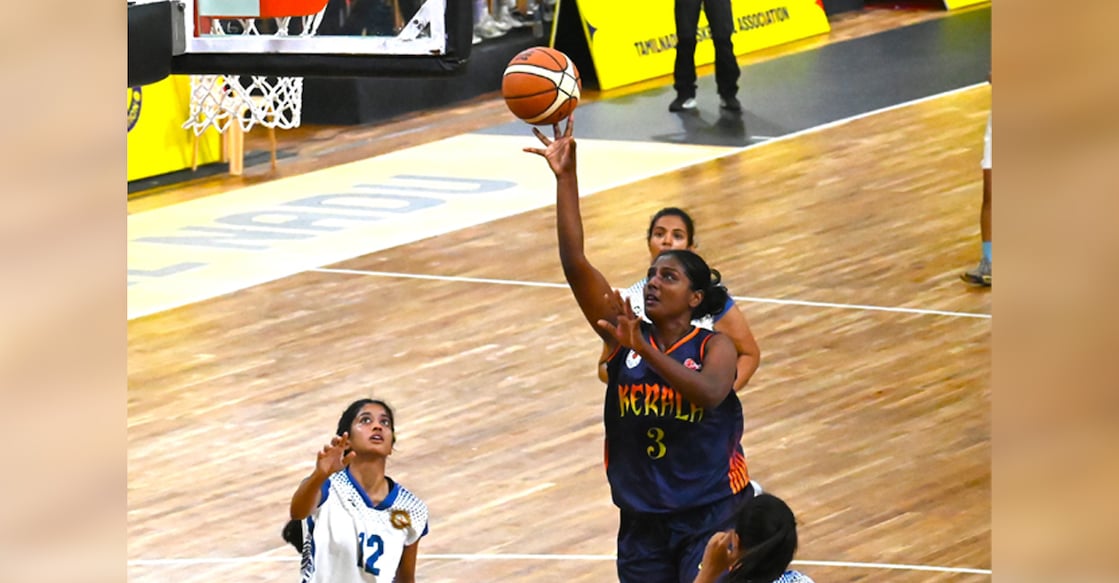 Sreekala R of Kerala goes for the basket against Madhya Pradesh in a Senior National Basketball Championship at the Jawaharlal Nehru Indoor Stadium in Chennai on January 5, 2026. Photo: Special arrangement