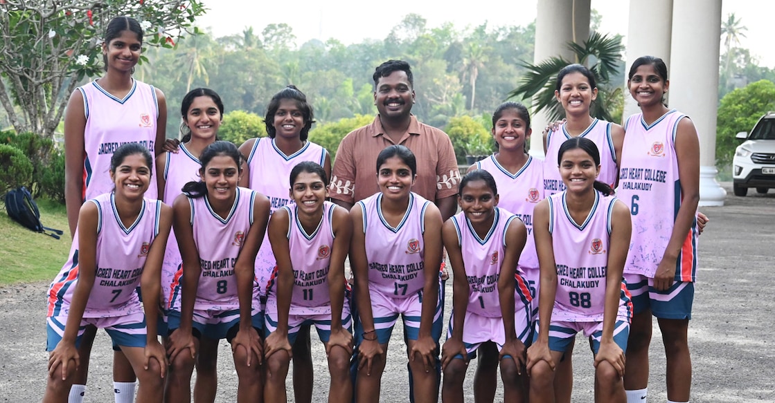 Players and coach of Sacred Heart College, Chalakudy pose during the George Mathew Memorial All Kerala Inter-Collegiate Basketball Tournament at the Providence College of Engineering in Chengannur. Photo: Special arrangement