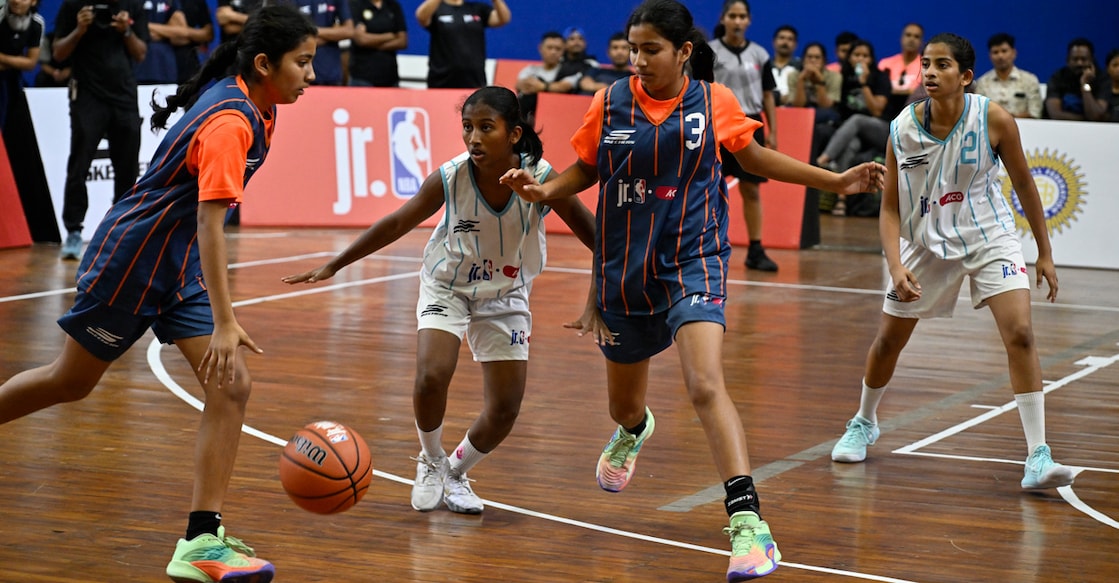 Action between Providence GHSS (white) and Sacred Heart Sr Secondary School, Ludhiana in the Under-14 girls’ final of the ACG Junior NBA 3 v 3 National Tournament in New Delhi. Photo: Josekutty Panackal/Malayala Manorama