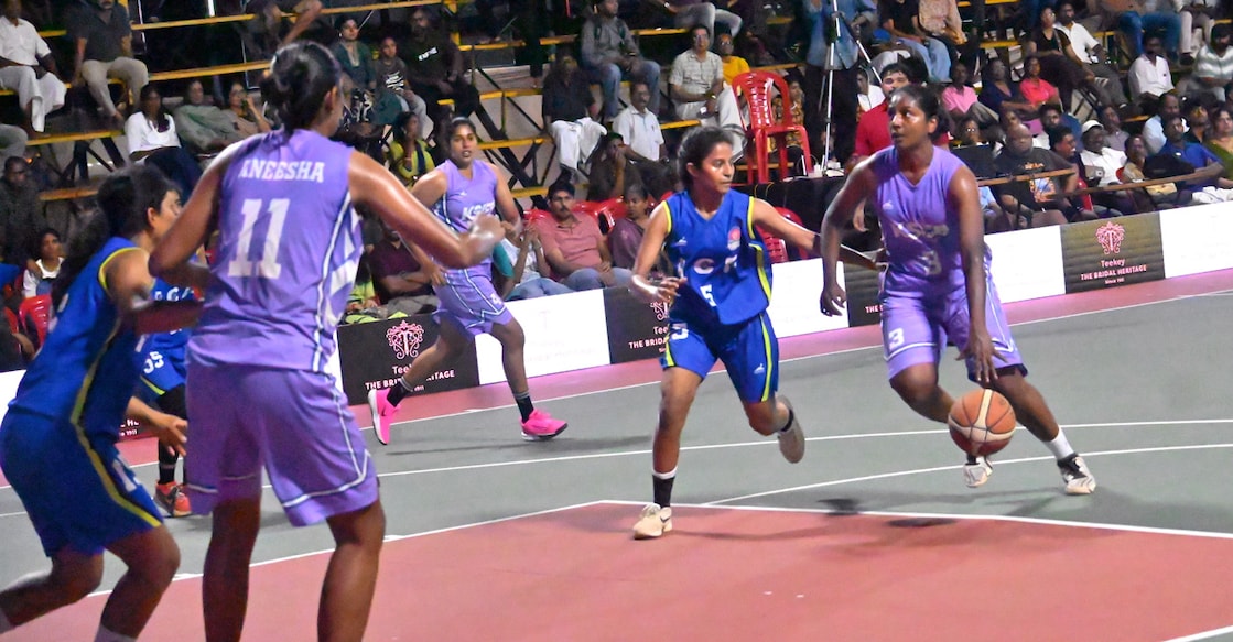 Sreekala R of KSEB in action against ICF in the Feasto Golden Jubilee Basketball Tournament at the Dr CBC Memorial Basketball Court at Mananchira in Kozhikode on April 10, 2026. Photo: Special arrangement