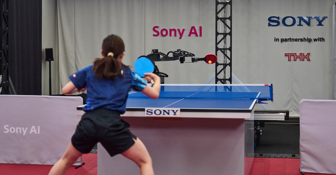 Sony AI autonomous robot Ace fires a shot back to its human opponent, table tennis player Minami Ando, during a match in December 2025 in Tokyo, Japan, as seen in this photograph released on April 22, 2026.  Photo: Sony via Reuters
