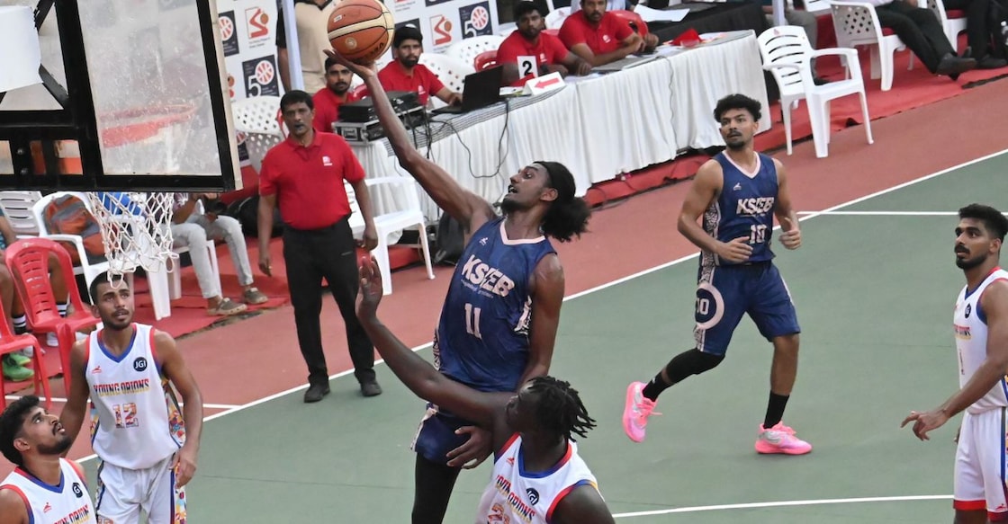 Sejin Mathew of KSEB goes for the basket against Young Orions in a Feasto Golden Jubilee Basketball Tournament game at Mananchira in Kozhikode on April 8, 2026. Photo: Special arrangement