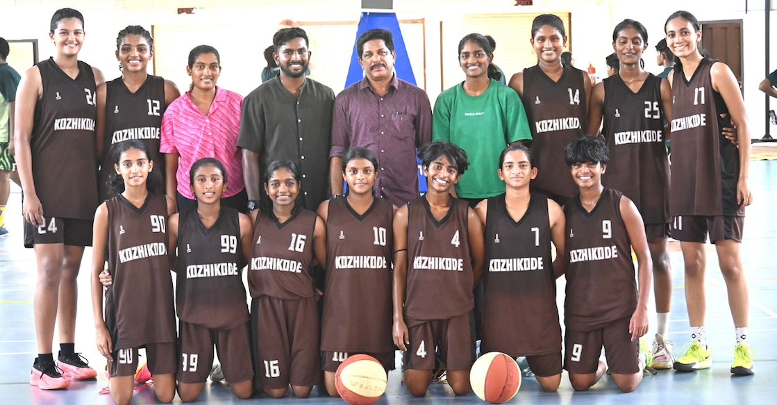 Kozhikode girls team pose with officials at the 42nd Kerala State Youth Basketball Championship at Kanhangad in Kasaragod. 