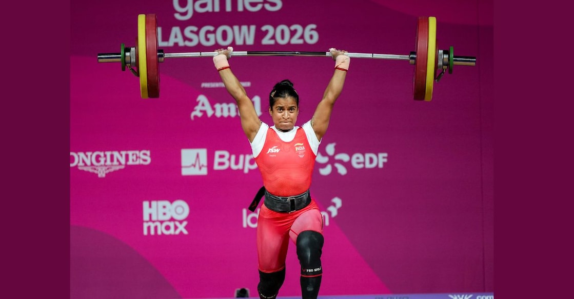 Gyaneshwari Yadav competes during the women's 53kg weightlifting final at the 23rd Commonwealth Games in Glasgow, Scotland. Photo: PTI