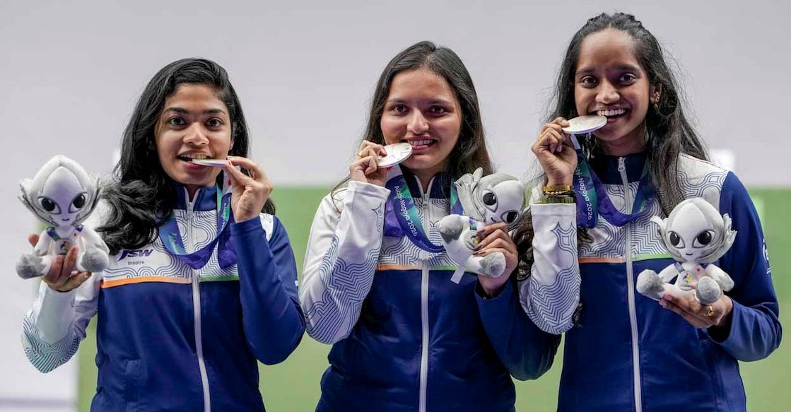 Nagoya: From left, India's Vidarsa Vinod, Sonam Maskar and Elavenil Valarivan pose for photographers after winning silver medals in the 10m Air Rifle Women Team Final event during the 20th Asian Games, in Nagoya, Japan, Sunday, Sept. 20, 2026. (PTI Photo/Atul Yadav) (PTI09_20_2026_000141B) *** Local Caption *** 