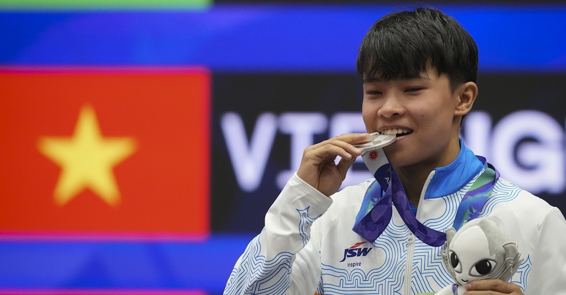 Roshibina Devi with the medal. Photo: PTI