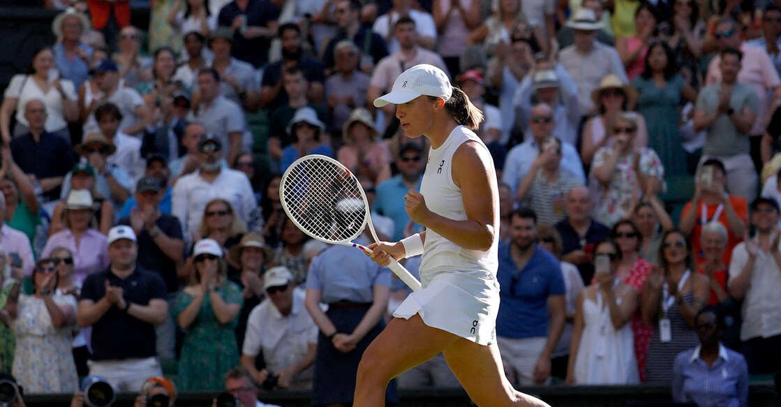 Poland's Iga Swiatek celebrates after winning her semifinal match against Switzerland's Belinda Bencic. Photo: Reuters/Stephanie Lecocq
