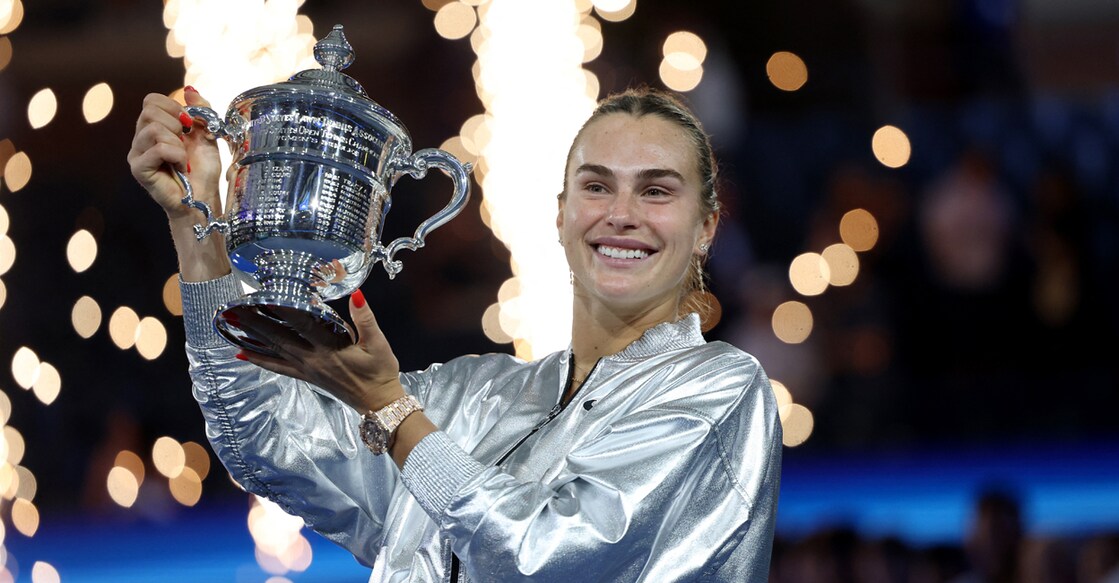 Aryna Sabalenka celebrates with the trophy after winning the women's singles final. Photo: REUTERS/Mike Segar