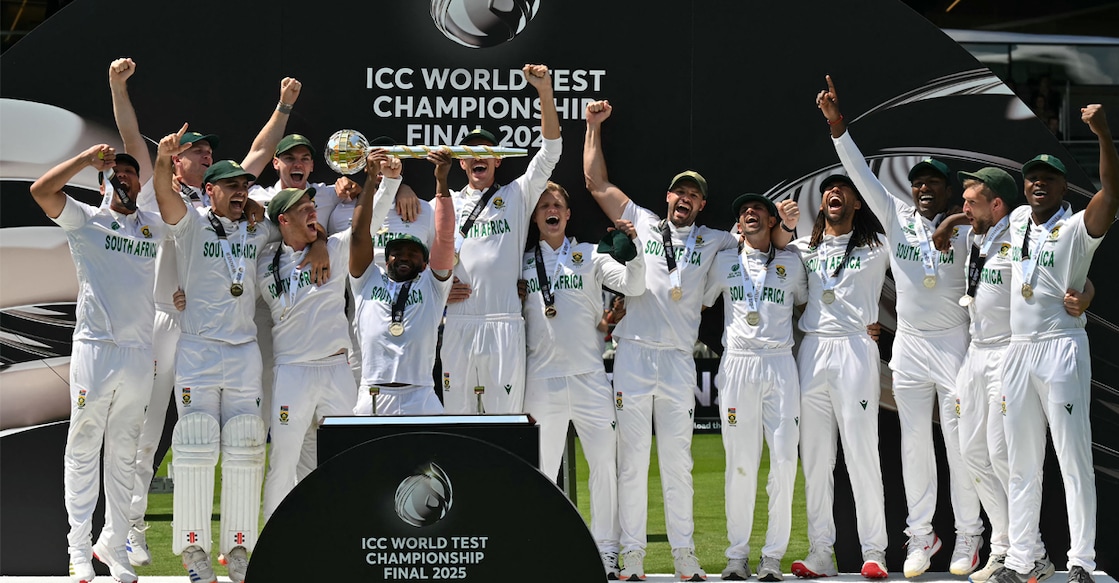 south-africa-test-championship-trophy South Africa's captain Temba Bavuma lifts the ICC World Test Championship Mace as he celebrates with teammates after victory. Photo: AFP