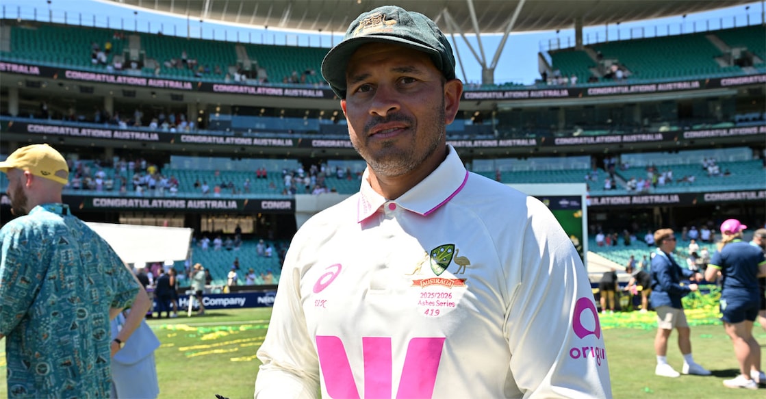 Australia’s Usman Khawaja signs autographs for fans after the fifth Ashes cricket Test between Australia and England at the Sydney Cricket Ground in Sydney on January 8, 2026.