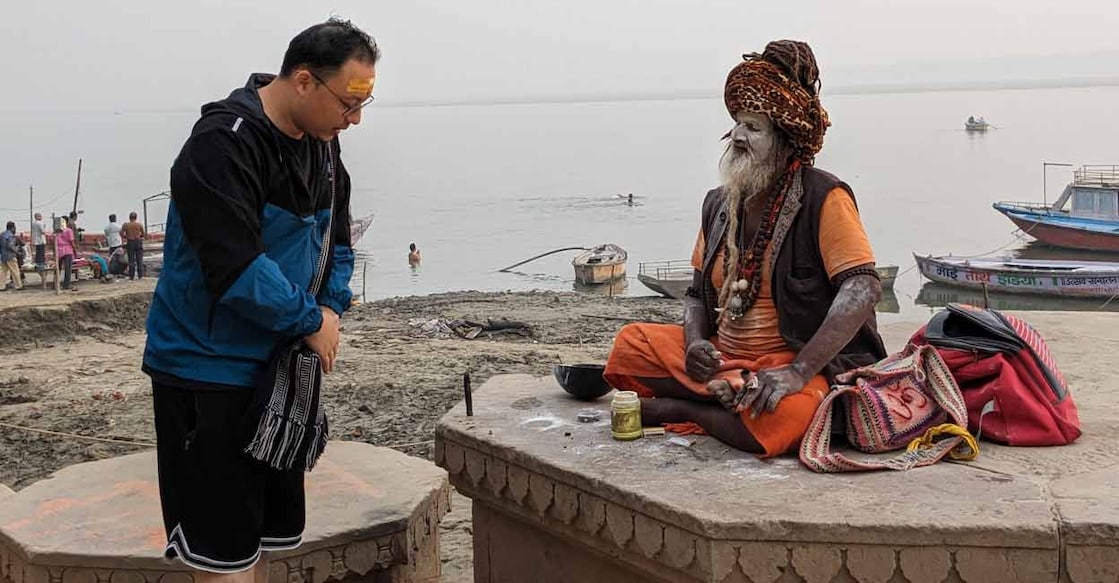 A sadhu and a visitor. All photos by Paul Zacharia. 
