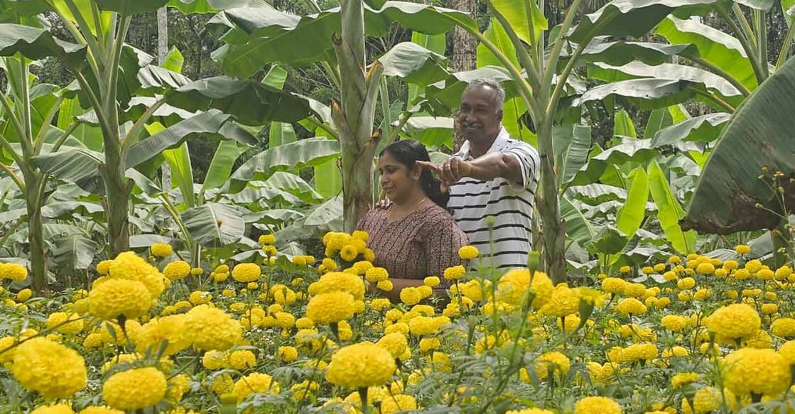 Roy Kavalakkat and wife Anna in their farm. Photo: Special Arrangement
