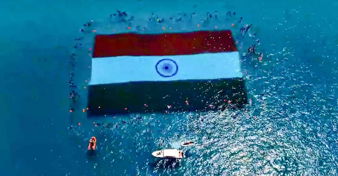 The deployment of the Indian tricolour, measuring approximately 60 by 40 metres, beneath the sea at Swaraj Dweep in the Andaman and Nicobar Islands. Photo: PTI
