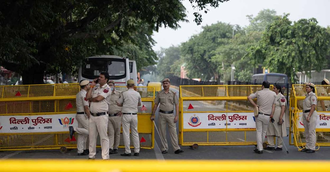 Police have intensified security across the national capital, with heightened surveillance at borders, railway stations, bus terminals and other sensitive locations to prevent gatherings. Photo: AFP/Arun Sankar
