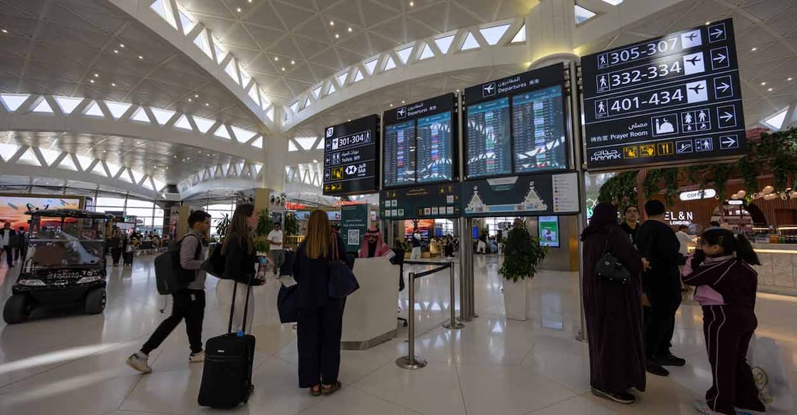 Passengers at the Riyadh airport. Photo: iStock/winhorse