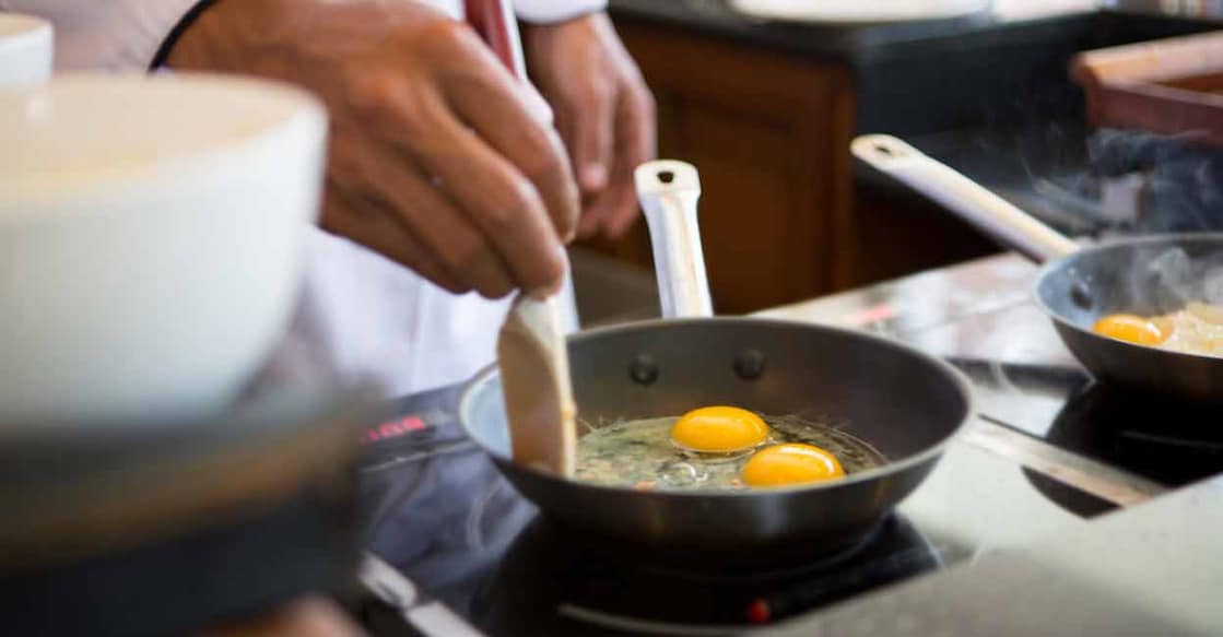 Our kitchens will have to seriously explore induction cooking as an alternate option during the LPG shortage. Photo: iStock/ShotShare