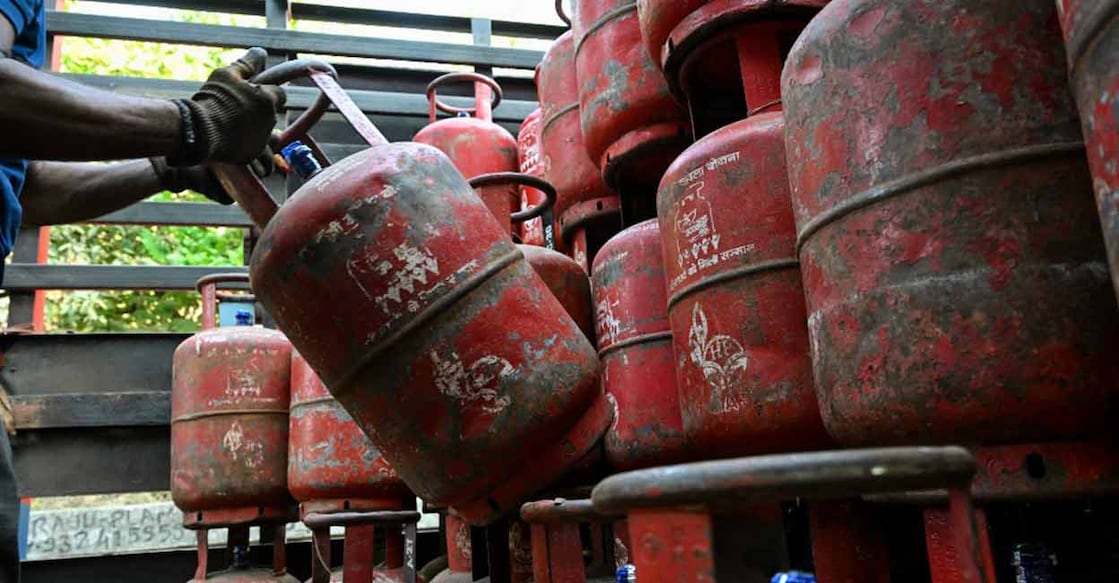 Currently, PMUY beneficiaries pay an effective Rs 642 for a 14.2-kg LPG cylinder after subsidy in Delhi. Representational Photo: AFP