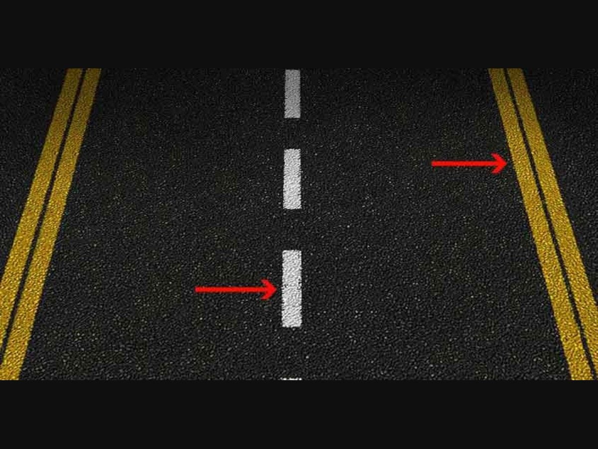 The yellow and white lines on the road have a message. Don't