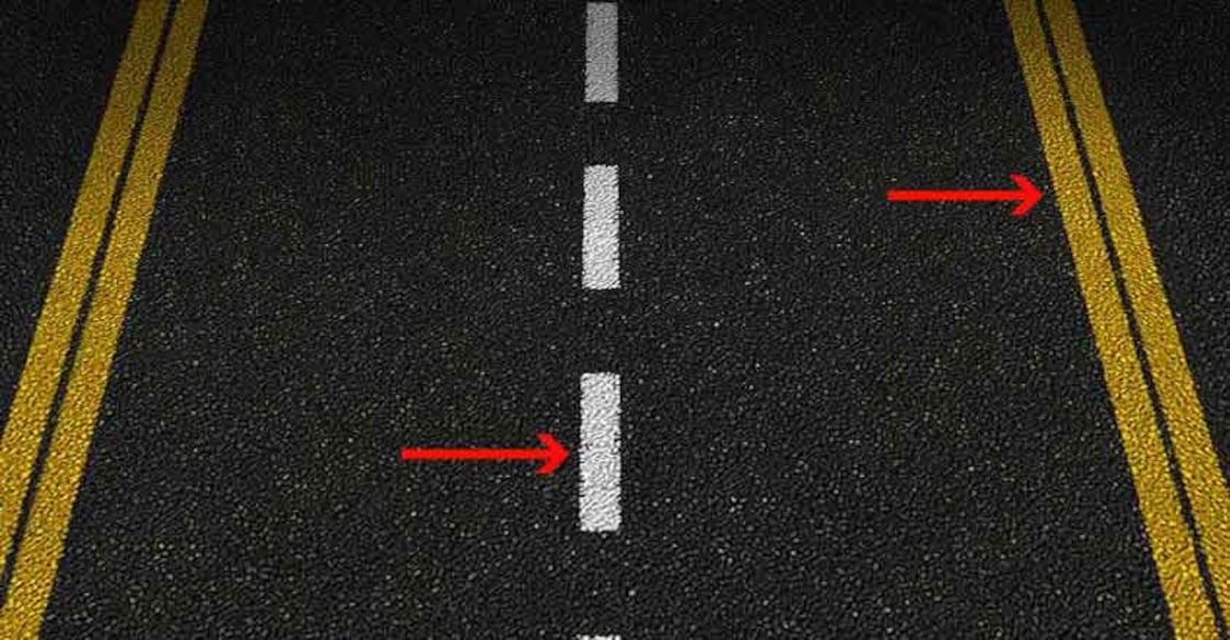 The yellow and white lines on the road have a message. Don't ignore them