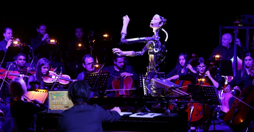 Music by numbers? Robot conducts human orchestra Music by numbers? Robot conducts human orchestra
