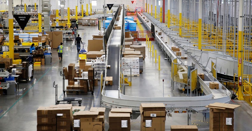 Amazon rolls out machines that pack orders and replace jobs Amazon rolls out machines that pack orders and replace jobs