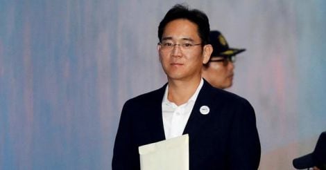 Samsung scion Lee walks free as South Korea court suspends jail term
