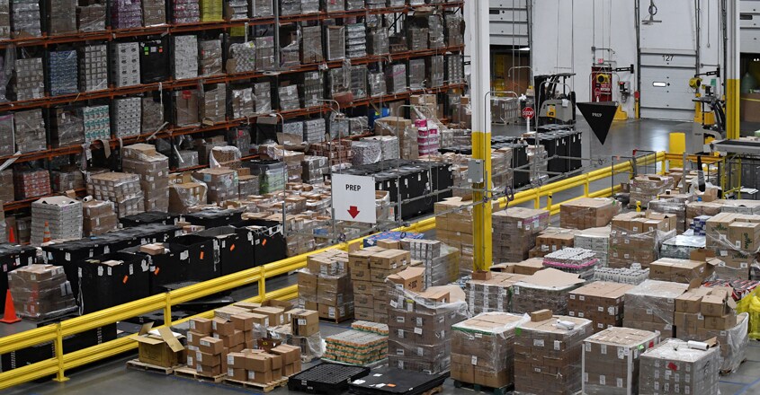 Amazon rolls out machines that pack orders and replace jobs