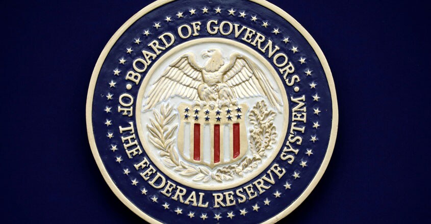 Fed slashes rates in emergency move to combat coronavirus risks FILE PHOTO: The Federal Reserve seal is seen during Chairman Jerome Powell news conference following the two-day meeting of the Federal Open Market Committee (FOMC) meeting on interest rate policy in Washington, U.S., January 29, 2020. REUTERS/Yuri Gripas/File Photo