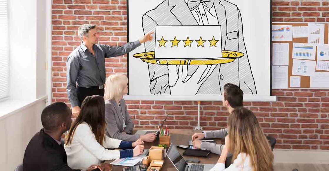 Team At Five Star Hospitality Service Presentation In Office