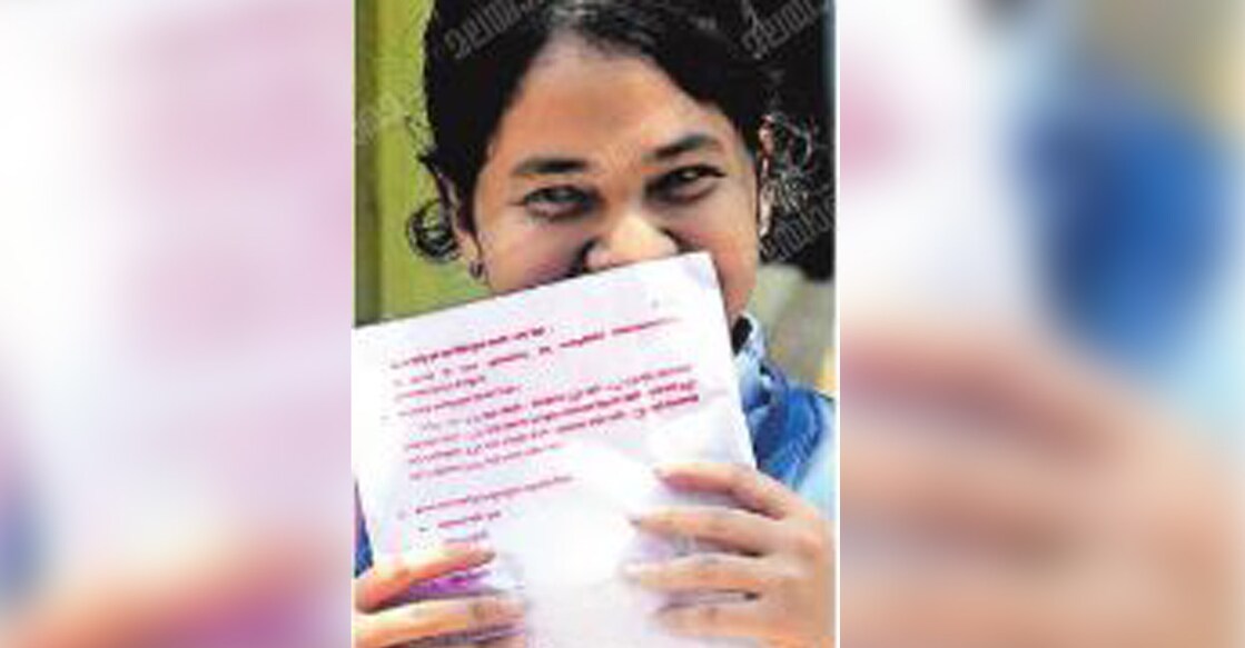question-paper-main A student of Govt Girls Higher Secondary School in Kochi holding a question paper after the first exam on Friday. Photo: Manorama