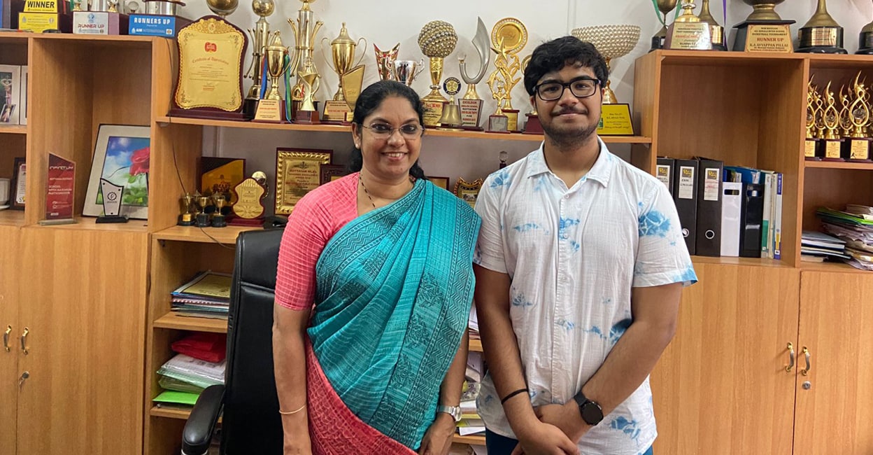pranav-kottayam-school-add-1 Pranav Rajesh Krishnan with Mini Abraham, principal of Mar Baselios Public School in Kottayam. Photo: Special Arrangement