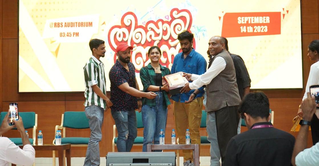 rajagiri-inflore-23-main The cast of the upcoming film 'Theeppori Benny' released the event's theme. Photo: Special Arrangement