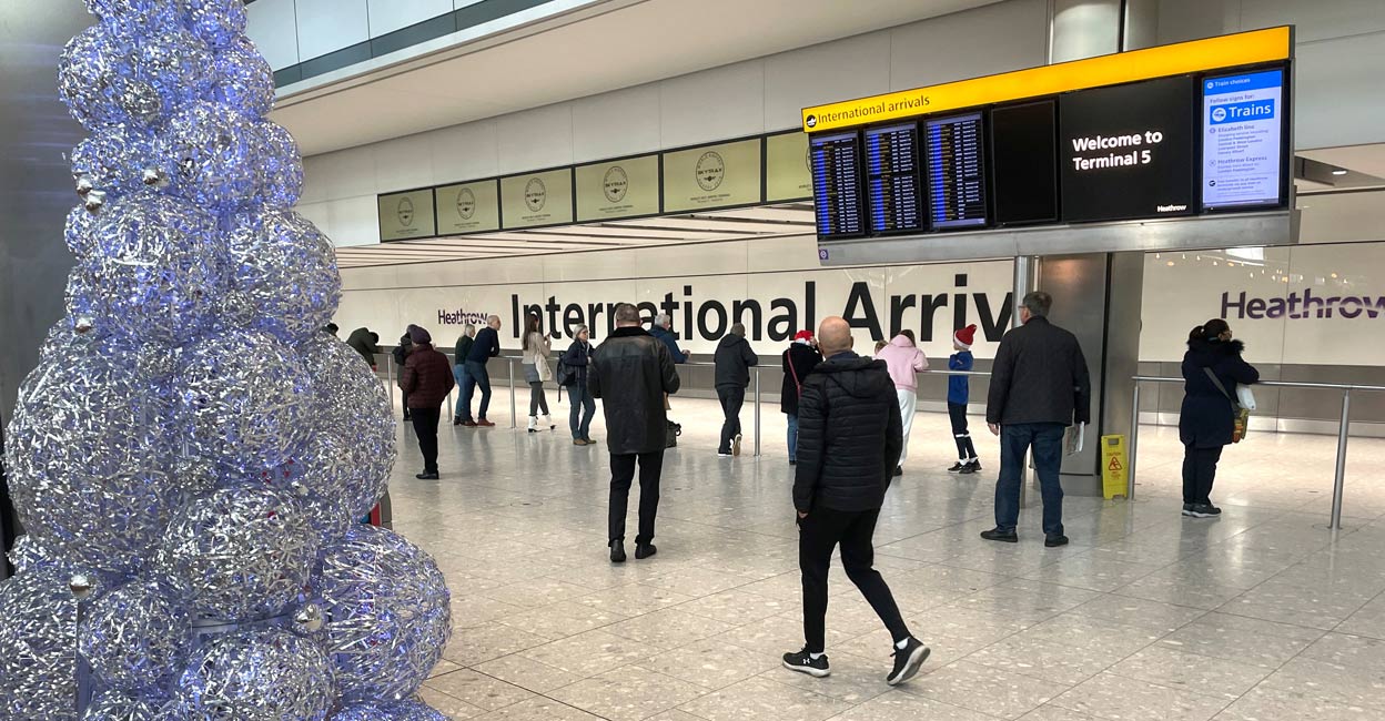People wait in the arrivals hall at terminal 5 of Heathrow Airport, near London, Britain, December 23, 2022. File photo: REUTERS/Peter Nicholls