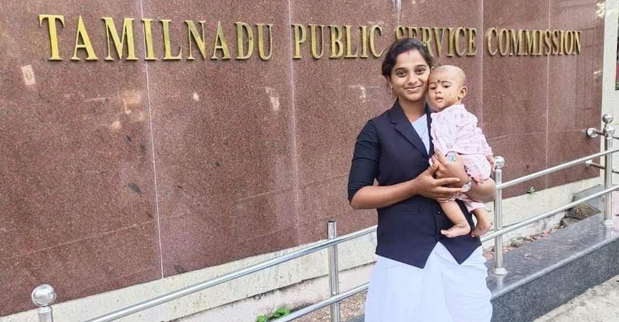 Sripathi V with her baby in front of the Tamil Nadu Public Service Commission office in Chennai. This photograph was shared by Tamil Nadu CM M K Stalin via X.