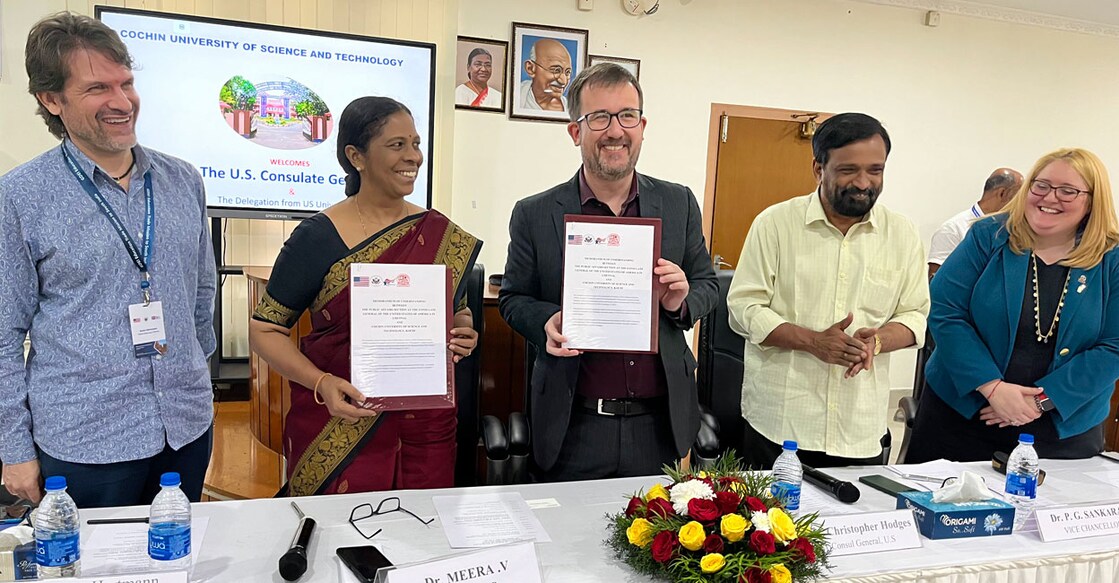 L-R: US Consulate General Chennai’s Cultural Affairs Officer Scott Hartmann; CUSAT Registrar Dr V Meera; US Consul General Chennai Christopher Hodges; CUSAT Vice Chancelor Dr P G Sankaran; and US Consulate General Chennai’s Counselor for Commercial Affairs Carey Arun at the signing of an MoU to establish an American Corner in CUSAT, Kochi on Friday. Photo: Special arrangement